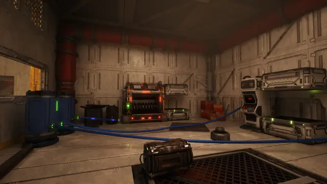 Machines linked by blue cables in a base room in The Last Caretaker.